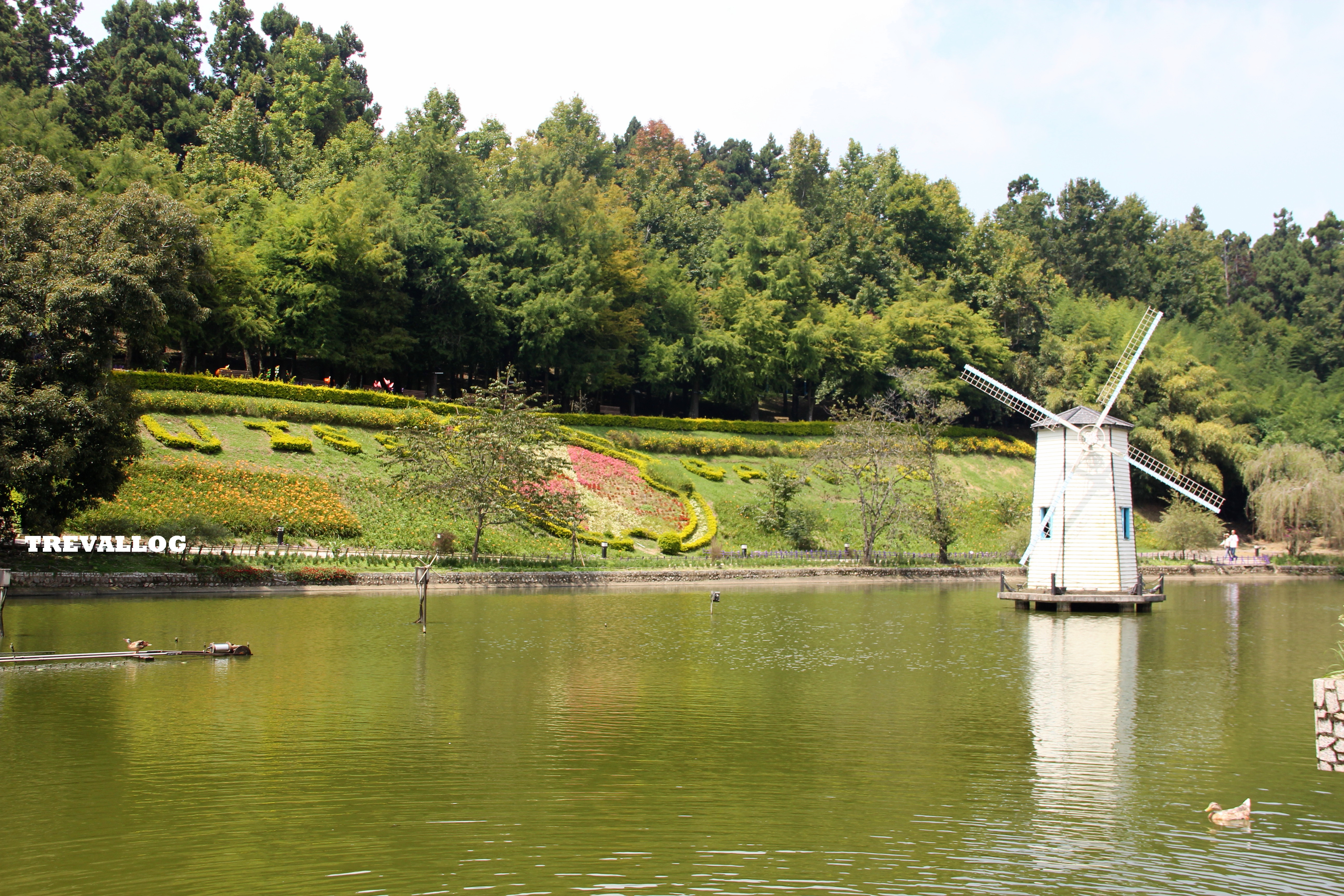 Little Windmill in the middle of the pond at Little Swiss Garden, Cingjing, Taiwan