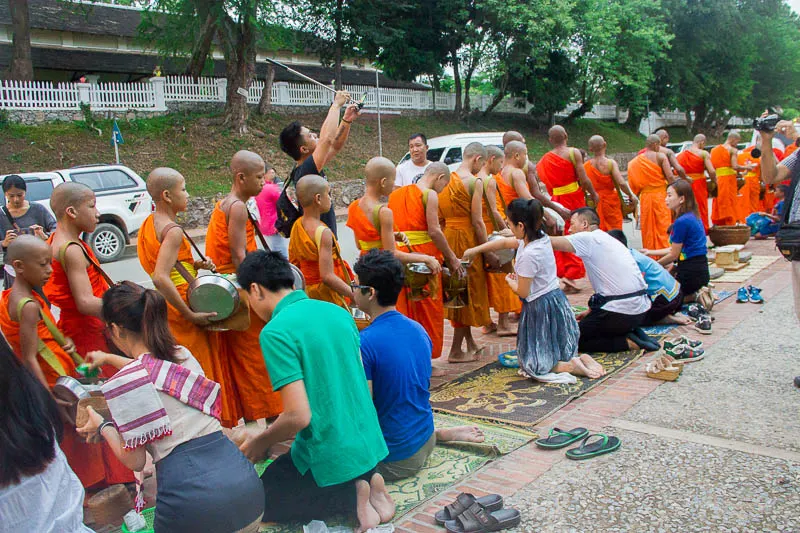 Luang Prabang Things to Do - irresponsible traveller alms giving ceremony