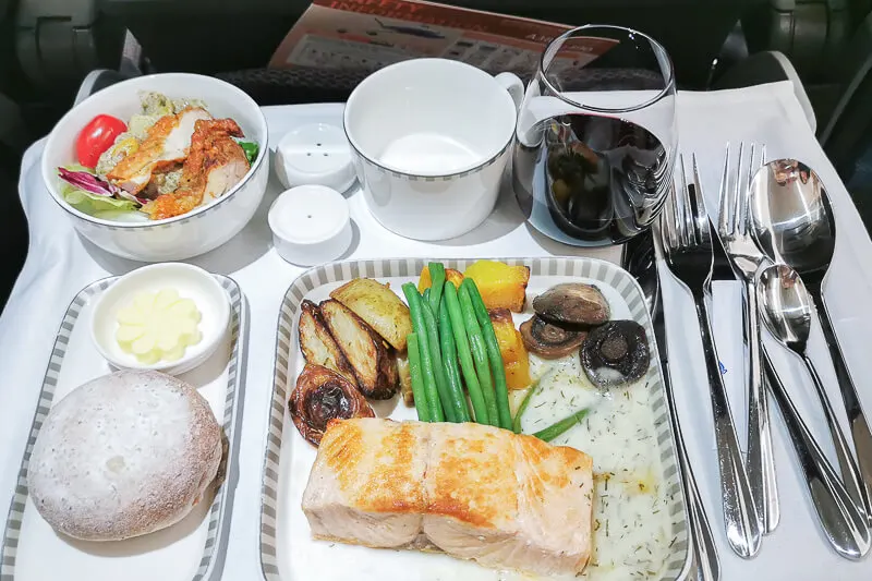 Economy class meal - Pan Fried Salmon with Dill Cream Sauce at Singapore Airline Restaurant A380 Changi