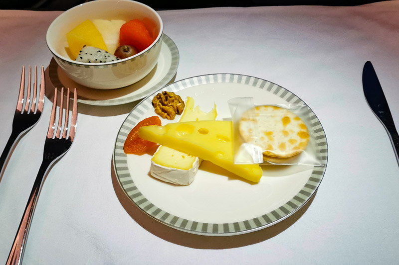 Dessert: Brie cheese and Emmental cheese with dried apricot and walnut